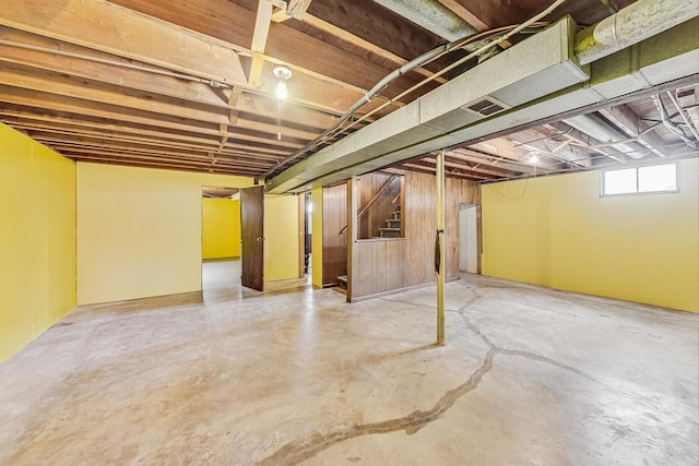 basement with stairway and visible vents