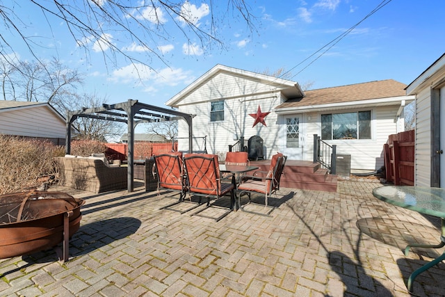 view of patio / terrace with outdoor lounge area, outdoor dining space, fence, and a pergola