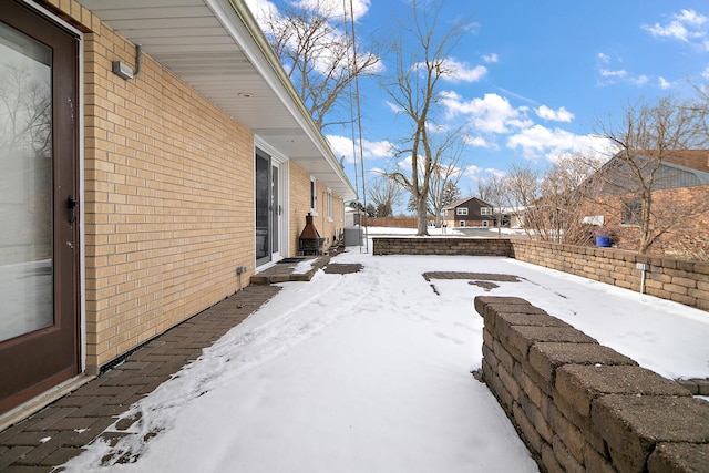 view of snow covered patio