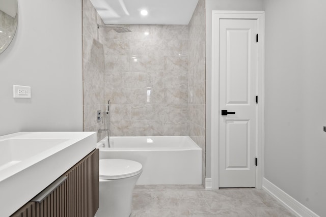 full bath featuring toilet, shower / bathing tub combination, vanity, and baseboards