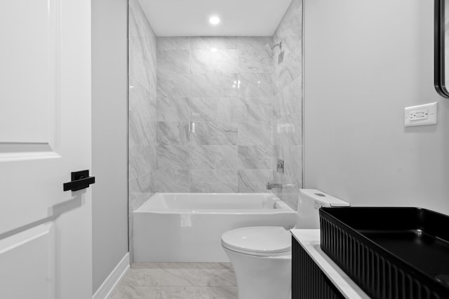 full bathroom with toilet, marble finish floor,  shower combination, and recessed lighting