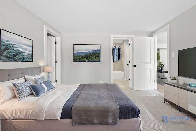 bedroom with light carpet