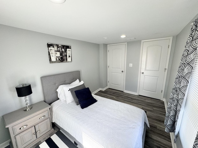 614 E Baltimore St, Wilmington, IL 60481 - bedroom featuring recessed lighting, baseboards, and dark wood-style floors
