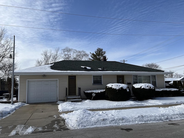 ranch-style house featuring a garage