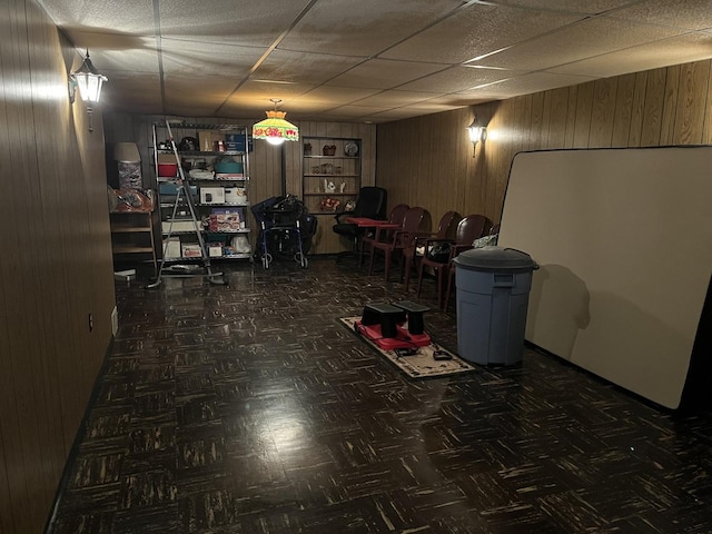 interior space featuring wood walls