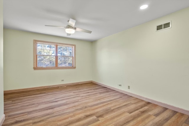 unfurnished room with ceiling fan, light wood-style flooring, recessed lighting, visible vents, and baseboards