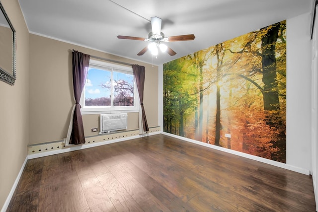 empty room featuring a wall mounted air conditioner, ceiling fan, baseboards, and wood finished floors