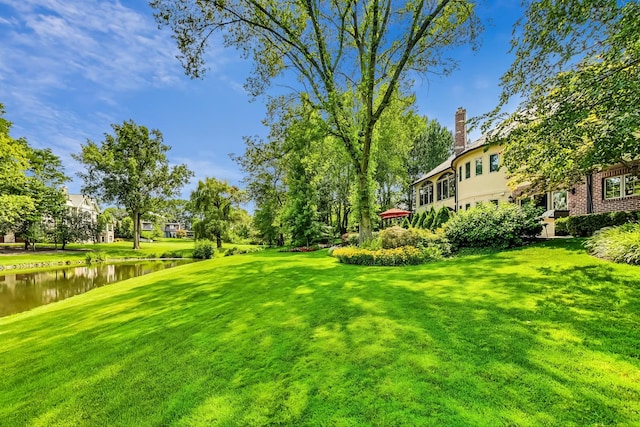 view of yard with a water view