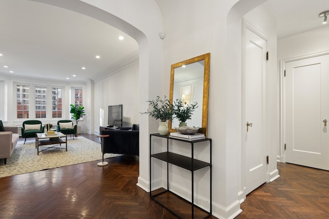 corridor with crown molding and dark parquet floors