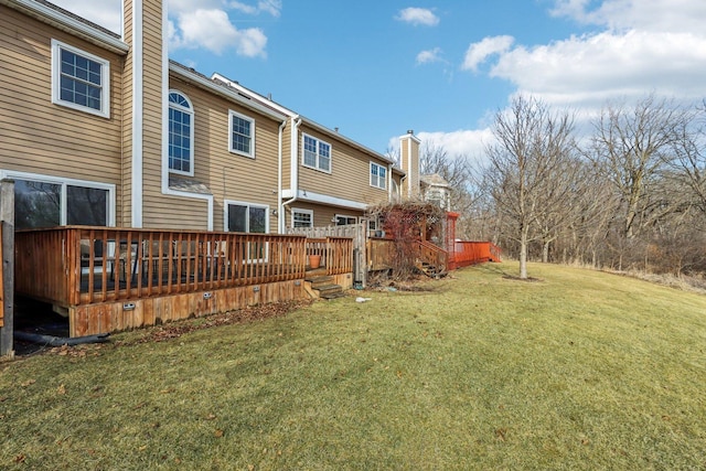 view of yard with a wooden deck