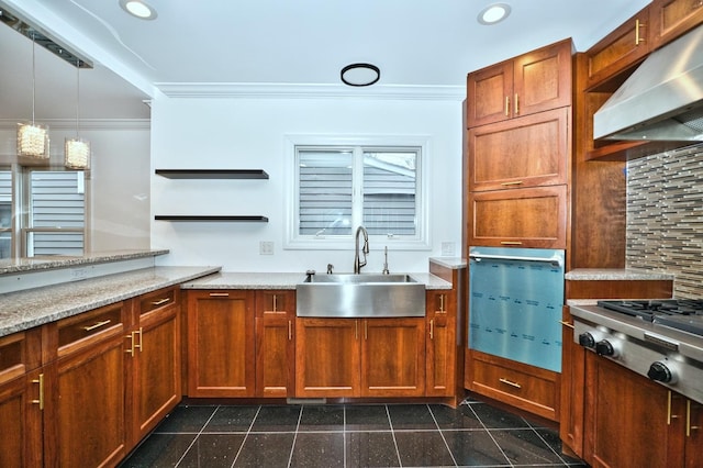 kitchen with decorative backsplash, crown molding, wall chimney range hood, and a sink