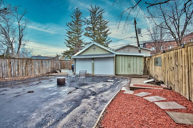 garage featuring fence