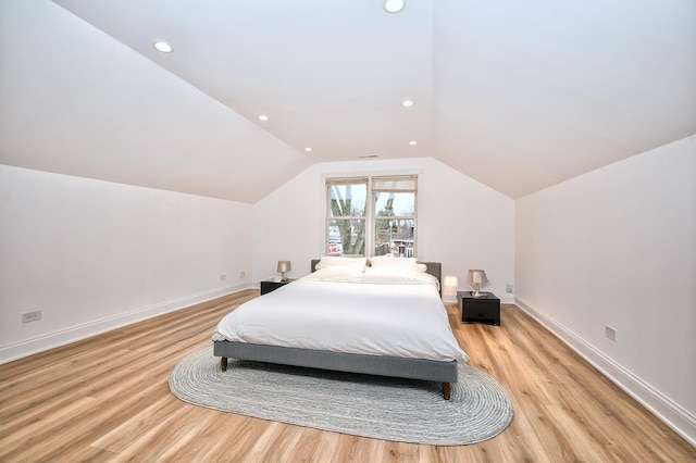 bedroom featuring recessed lighting, light wood-type flooring, lofted ceiling, and baseboards