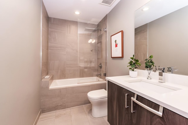 full bath with toilet, recessed lighting, vanity, visible vents, and tiled shower / bath