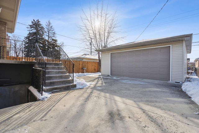 detached garage with fence