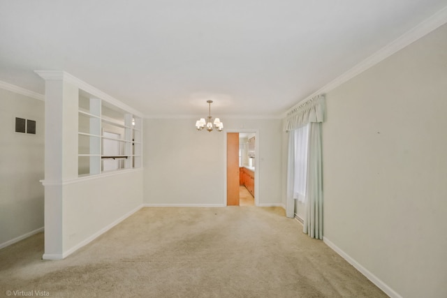 spare room featuring baseboards, crown molding, visible vents, and a notable chandelier