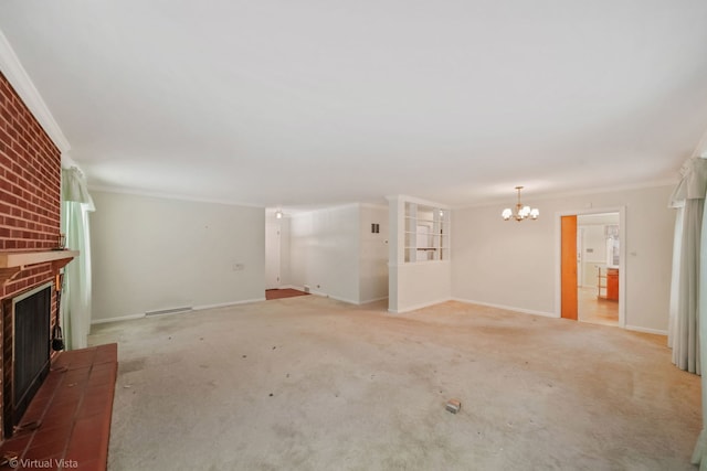 unfurnished living room featuring a brick fireplace, baseboards, ornamental molding, and light colored carpet