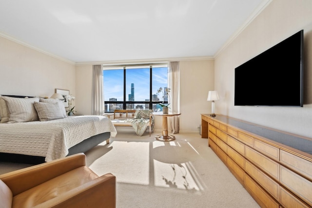 bedroom with light colored carpet, crown molding, and baseboards