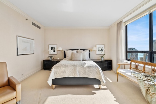 bedroom featuring visible vents, crown molding, light carpet, and baseboards