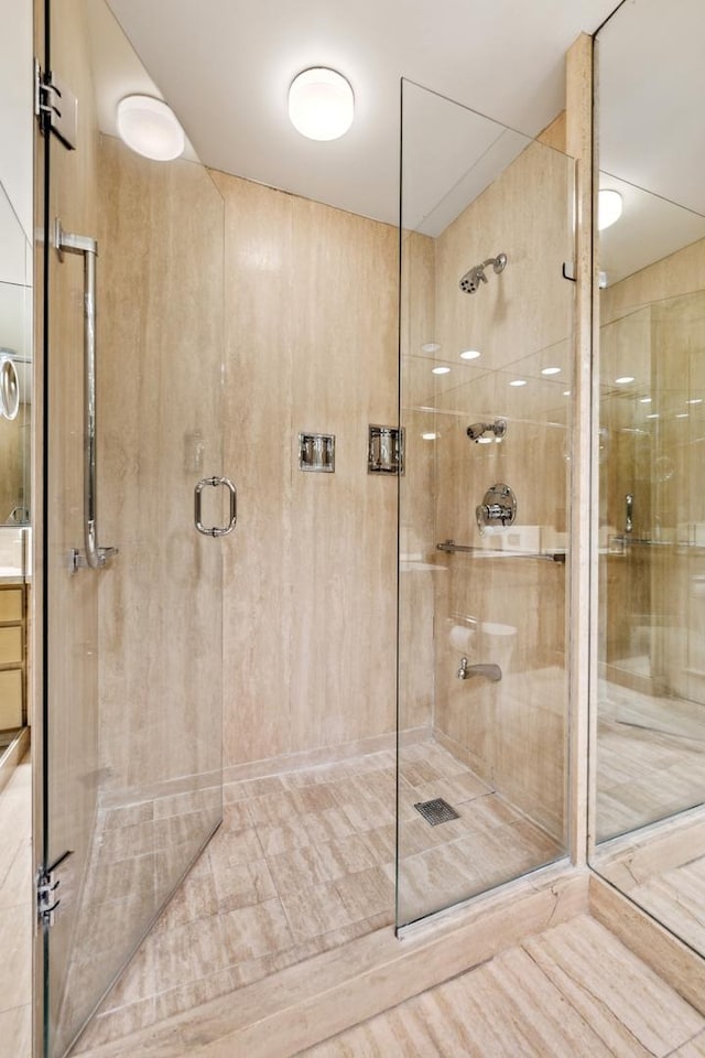 bathroom featuring a stall shower