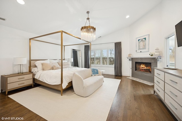 bedroom featuring recessed lighting, a fireplace, dark wood finished floors, and visible vents