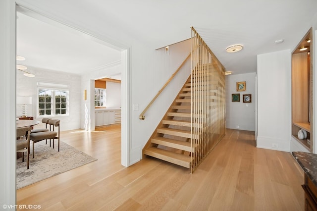 stairs with wood finished floors