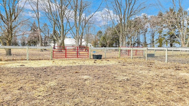 view of yard featuring a gate and fence