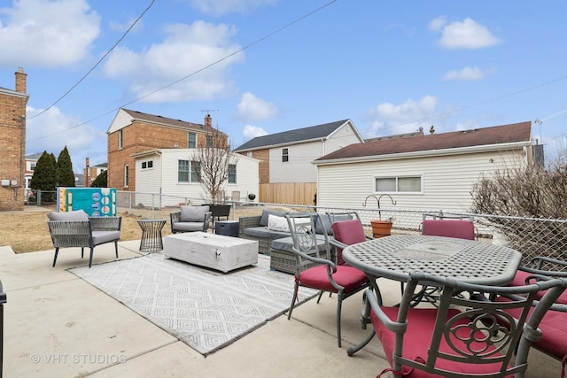 view of patio / terrace featuring fence and an outdoor living space