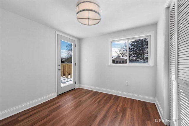 interior space with dark wood-type flooring