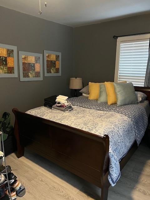 bedroom featuring light hardwood / wood-style flooring