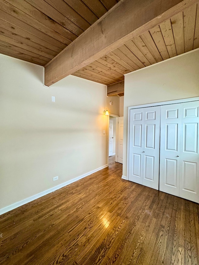 15126 S Sunset Dr, Dolton, IL 60419 - unfurnished bedroom featuring wooden ceiling, beamed ceiling, baseboards, and wood finished floors