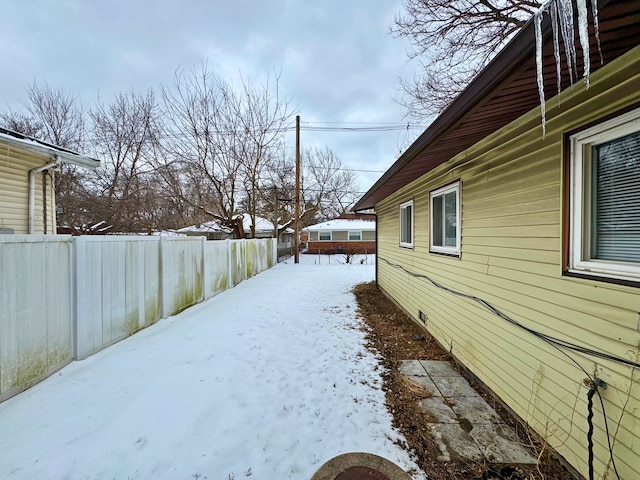 15126 S Sunset Dr, Dolton, IL 60419 - yard layered in snow featuring fence