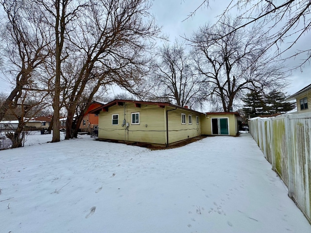 15126 S Sunset Dr, Dolton, IL 60419 - snow covered house with fence