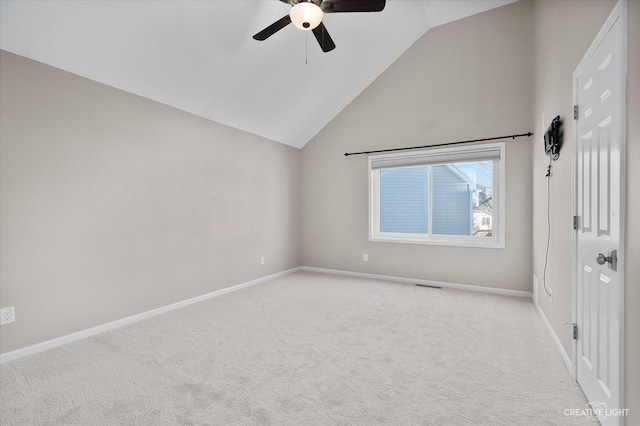 unfurnished room with light carpet, visible vents, a ceiling fan, and baseboards