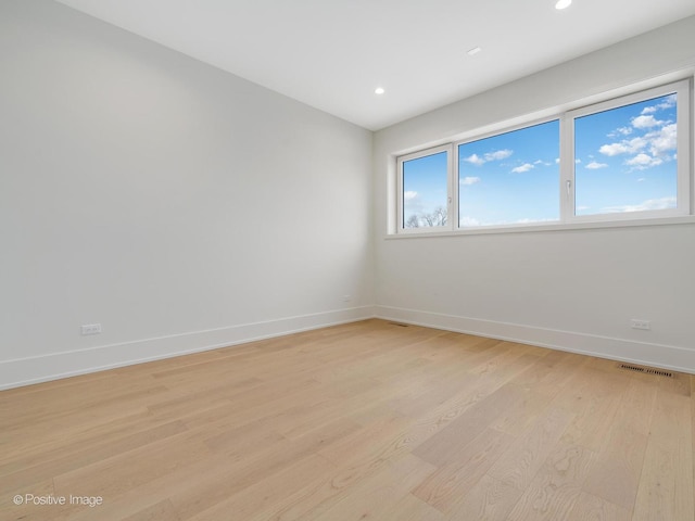 empty room featuring light hardwood / wood-style floors