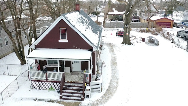 view of front of house with a garage and covered porch