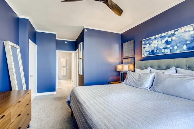 bedroom featuring light carpet, ceiling fan, baseboards, and ornamental molding