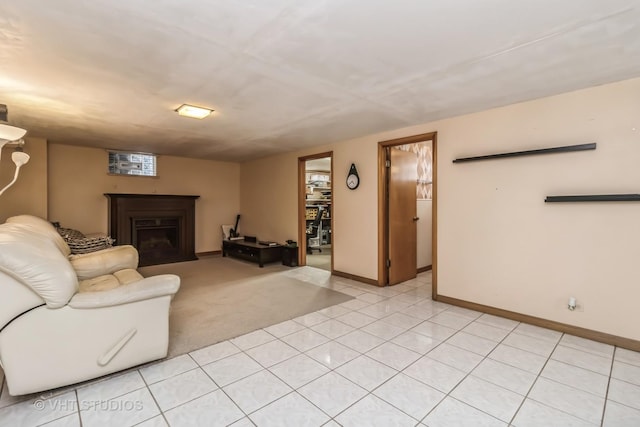 unfurnished living room featuring a fireplace with flush hearth, light tile patterned flooring, and baseboards