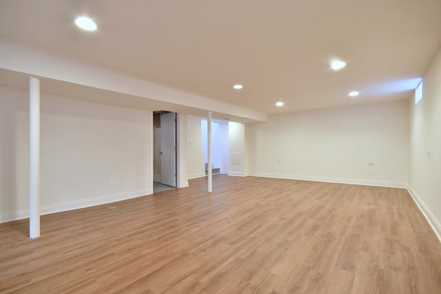 basement featuring light wood-type flooring