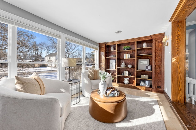 living area featuring light tile patterned floors