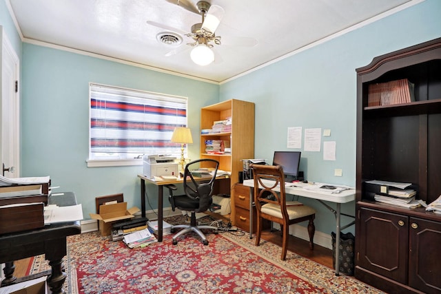 office featuring ceiling fan, ornamental molding, and light wood-type flooring