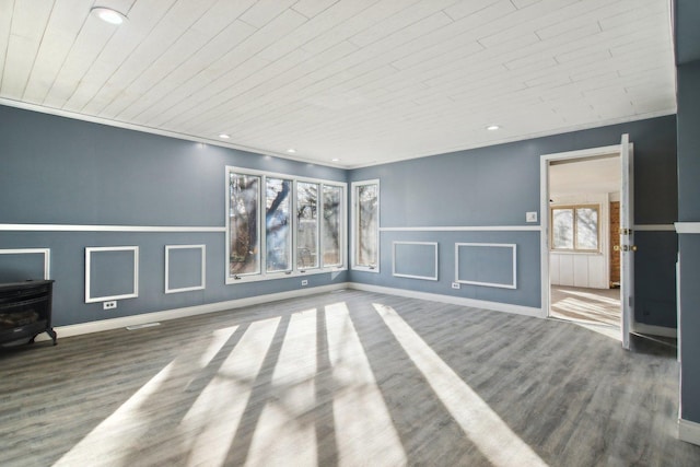 unfurnished living room with hardwood / wood-style floors, crown molding, and wooden ceiling