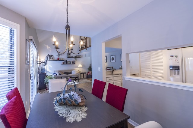 dining area with a chandelier