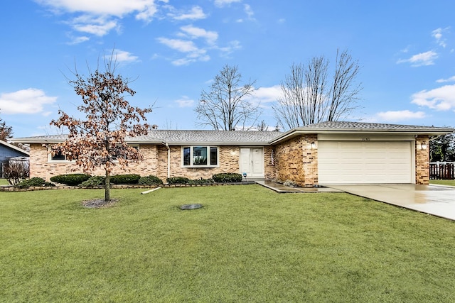 ranch-style home with a garage, a front yard, brick siding, and driveway