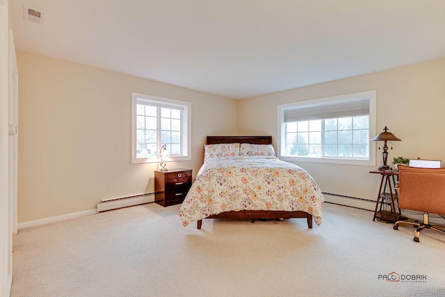 bedroom featuring carpet and a baseboard radiator