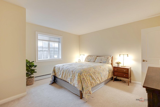 carpeted bedroom with a baseboard heating unit