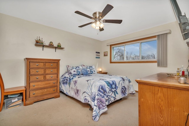 bedroom featuring carpet and a ceiling fan