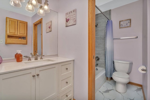 bathroom featuring marble finish floor, toilet, shower / bath combo, vanity, and baseboards