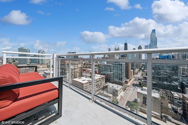 balcony featuring a city view