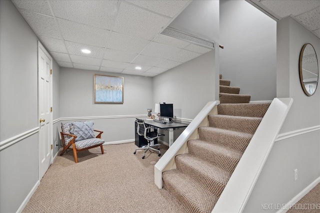 home office with recessed lighting, carpet flooring, a paneled ceiling, and baseboards